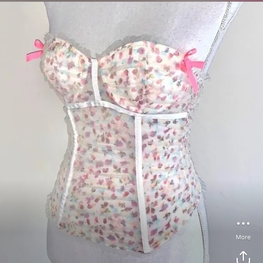 VS feminine pink corset top with bow detail, 34C
listing-status-banner